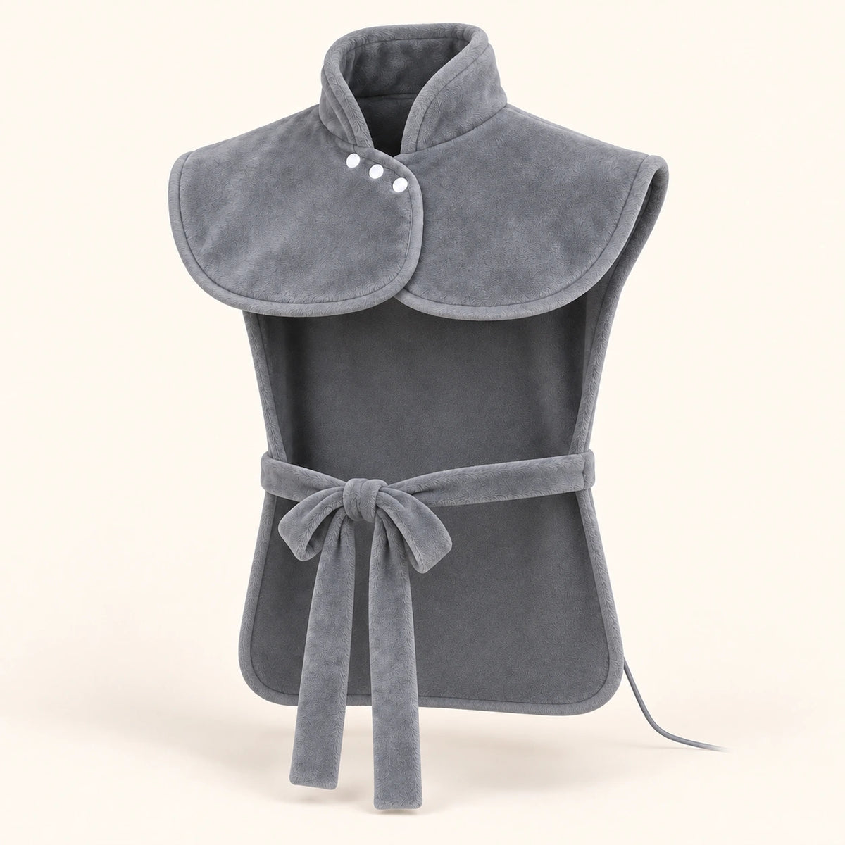 Front view of the gray Warmith wrap: upright collar with three white snaps, open sides and a narrow front tie.