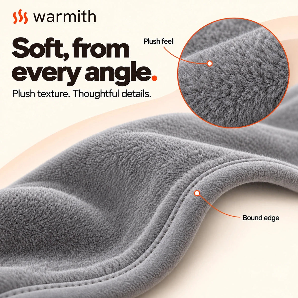 Macro view of the plush gray textile and its bound edge.