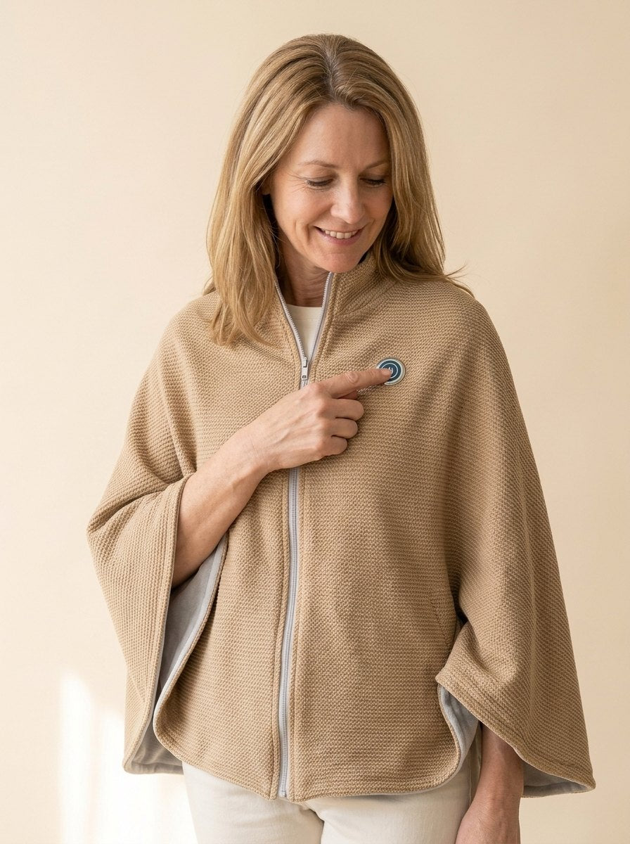 Finger pressing the lit button on the chest of the camel wrap